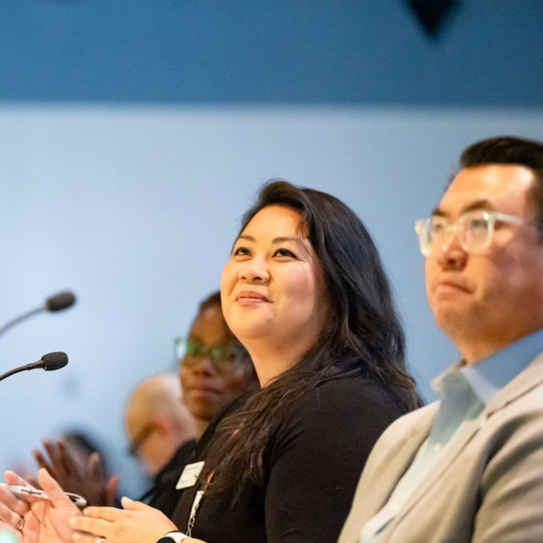 IMPACT Pitch 2026 judges Adfia Bristol, HazelMae Overturf, and Joe Nguyễn watch a finalist presentation.